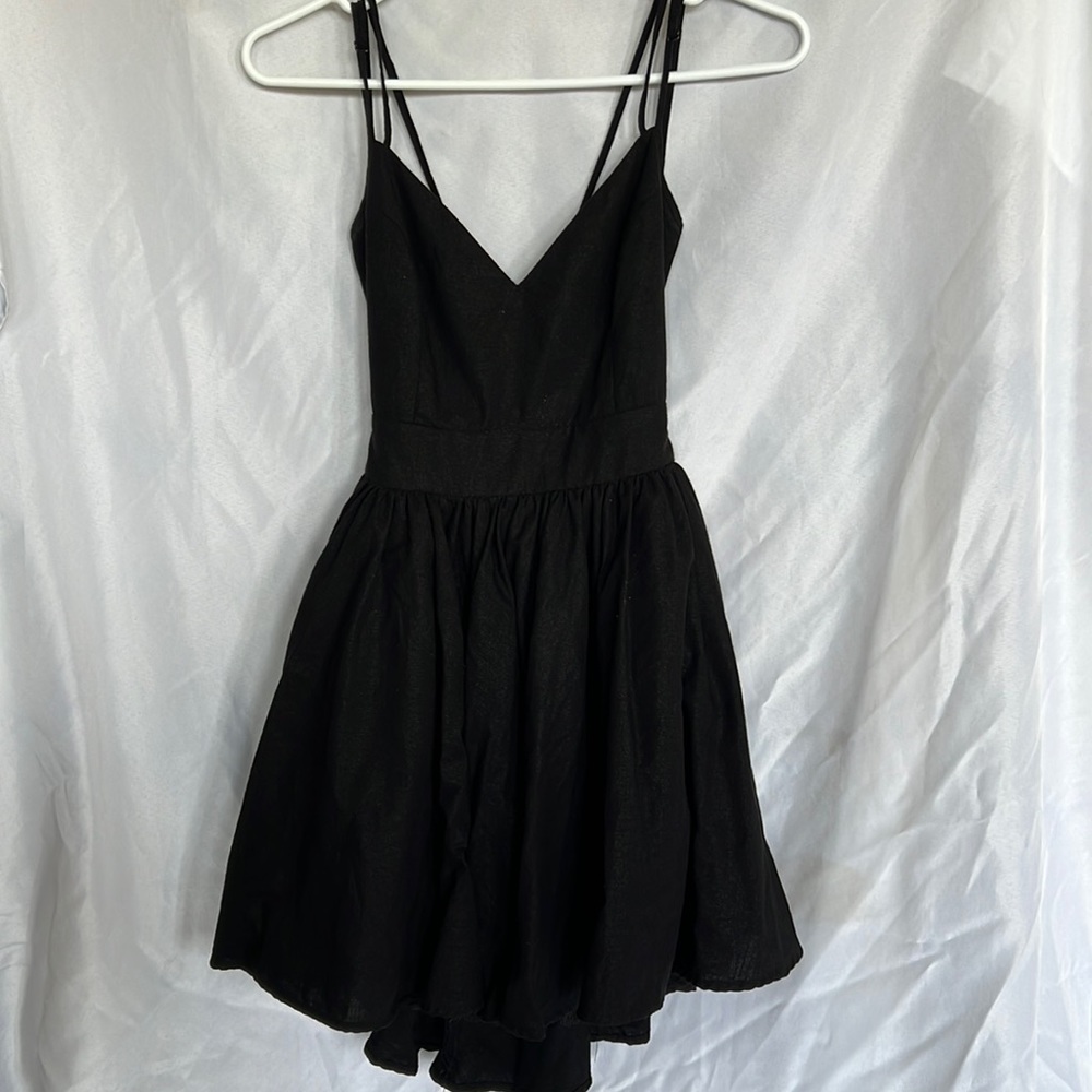 Black cross back fit and flare homecoming semi formal dress size Medium